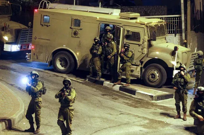 Occupation forces raid the town of Beit Rima northwest of Ramallah and ...